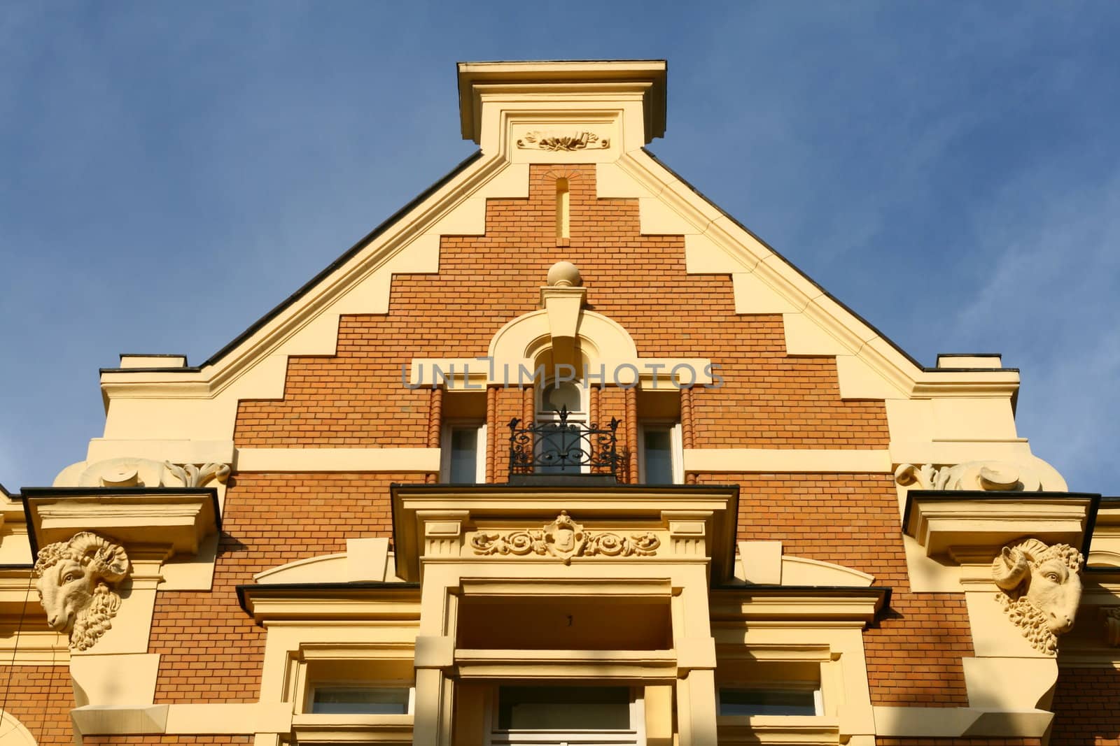 Facade of the top and roof of the old house with ornaments