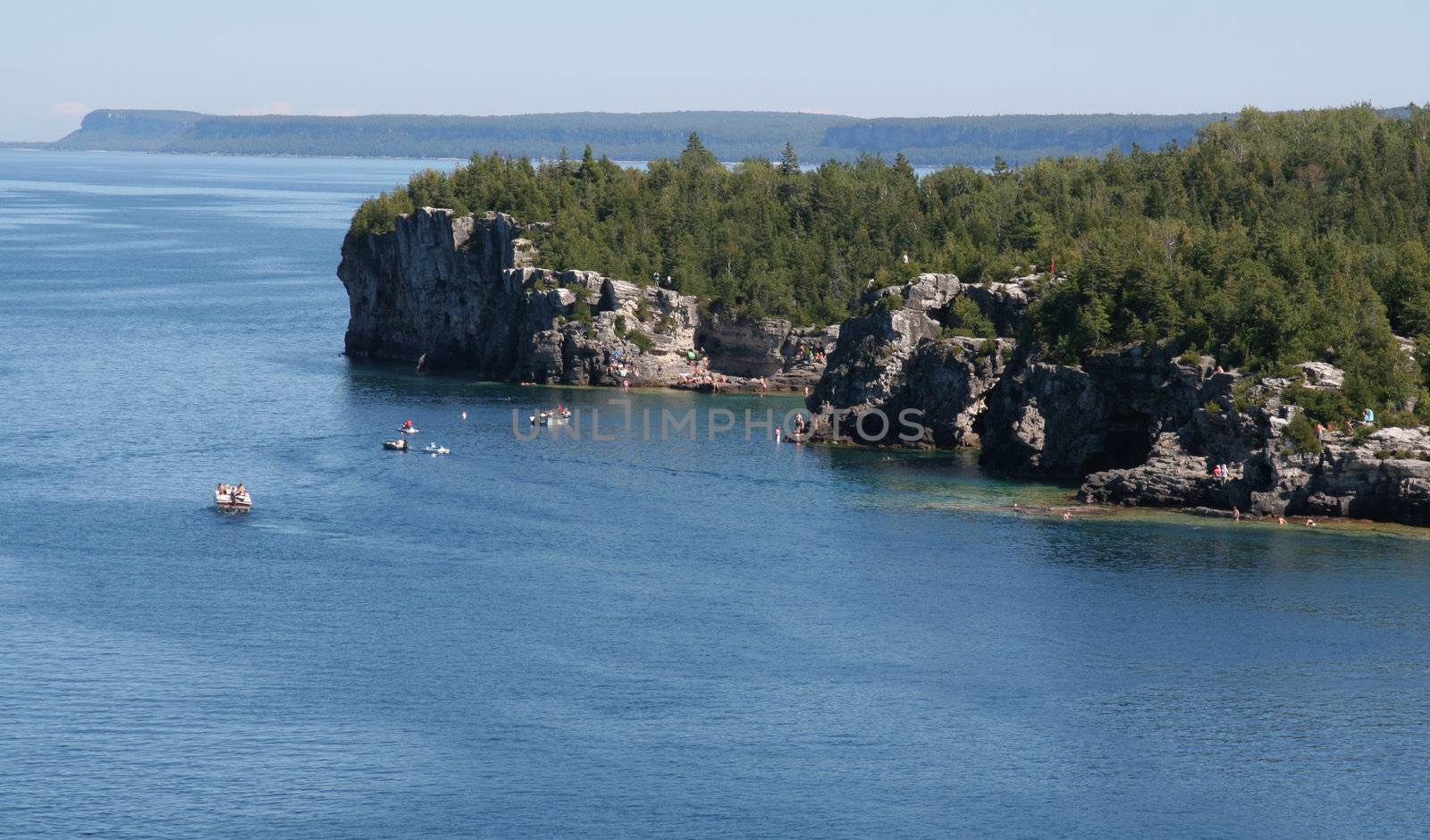 The 'Grotto' from a distance in Georgian Bay in  Bruce Penisula National Park in Ontario, Canada.  

