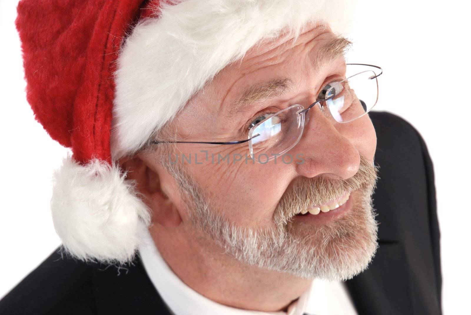 Senior Businessman wearing Santa claus hat.