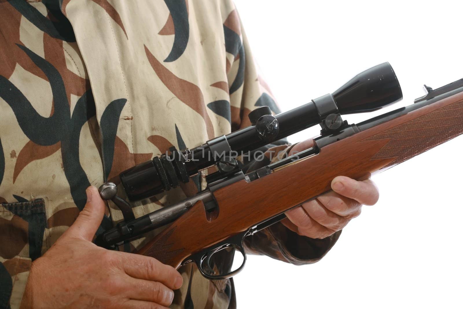 Close-up of a hunters hands on his riffle