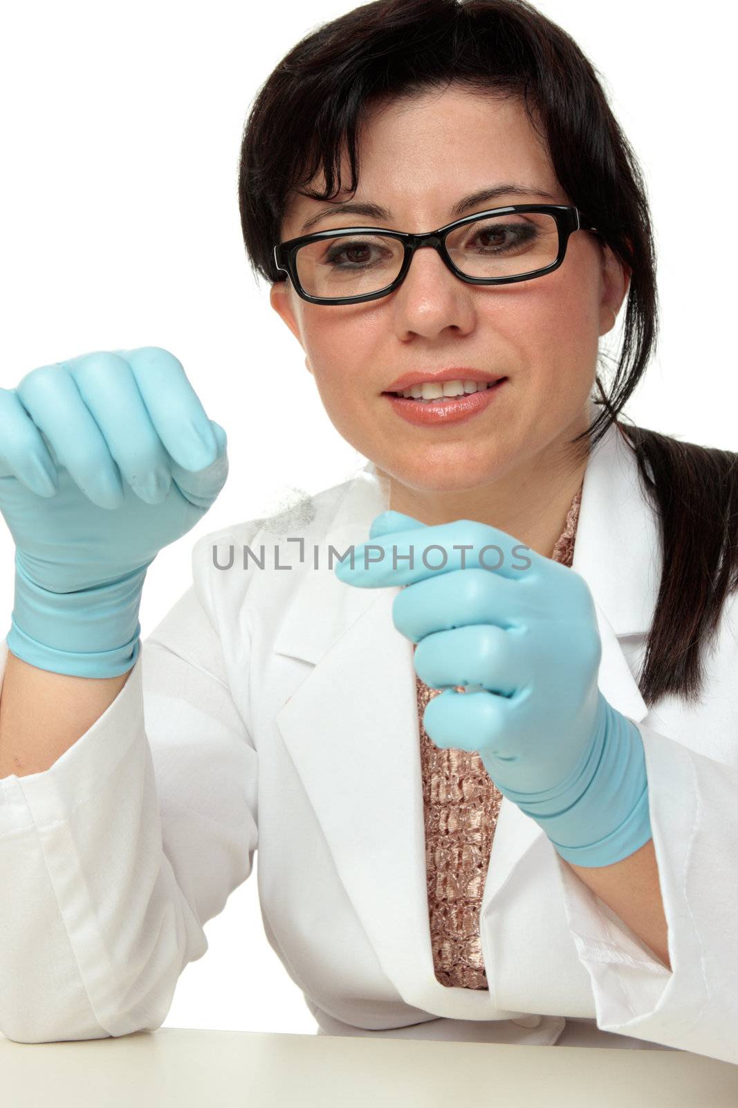 Crime scene investigator or forensic criminologist expert holding a fingerprint sample exposed with latent powder and lifted with tape.  White background.