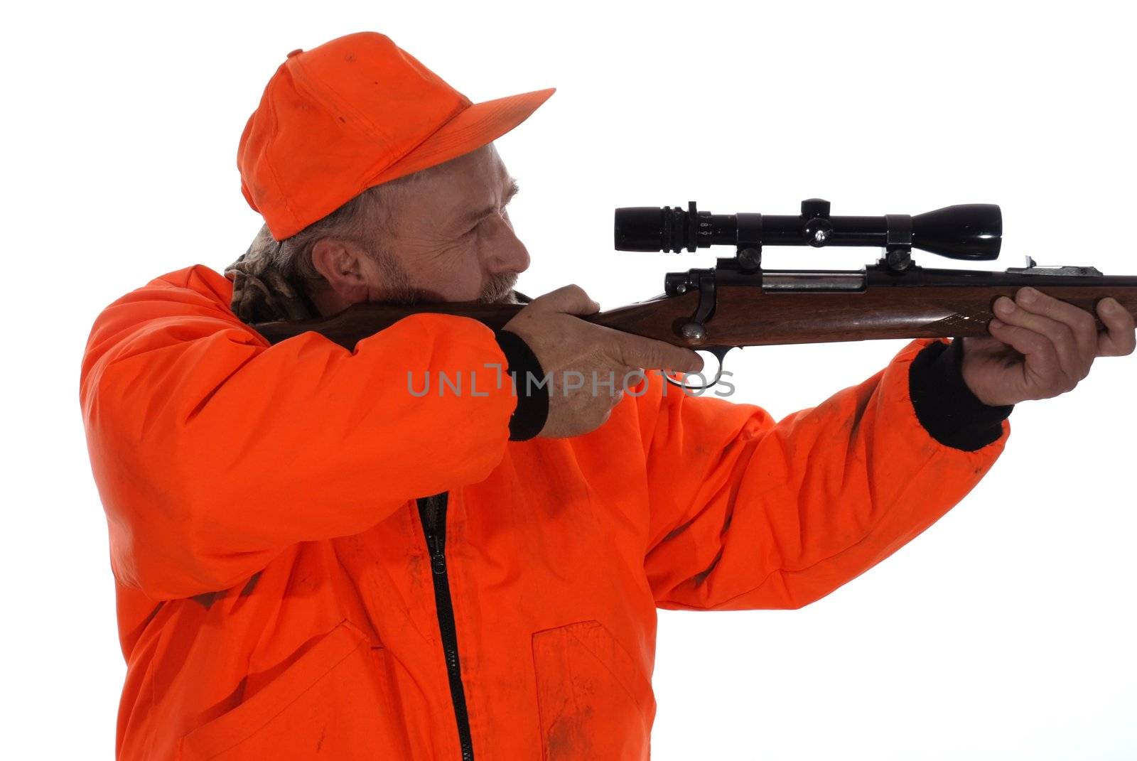 Hunter in blaze gear with riffle