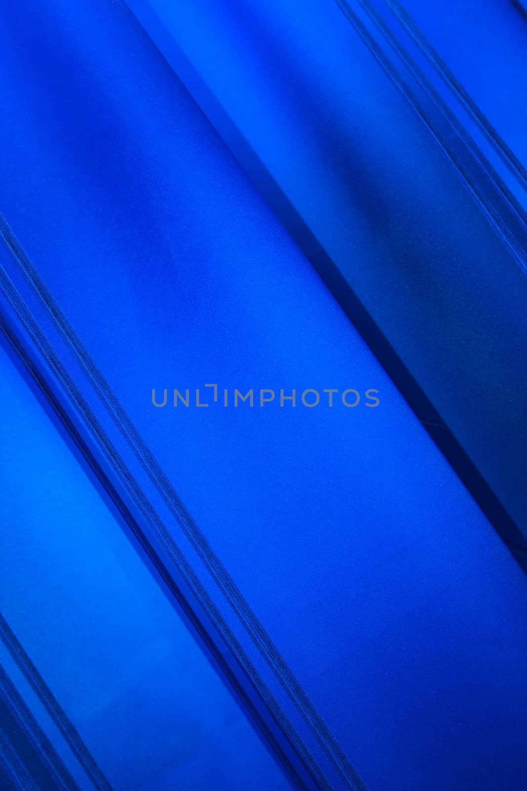 Blue abstract background with diagonal lines