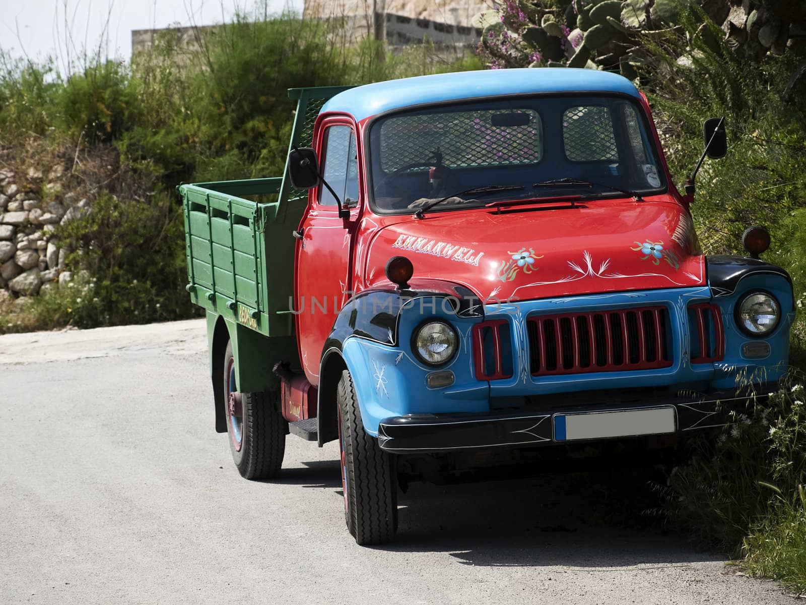 Old vintage rare truck painted in vivid colours in Malta