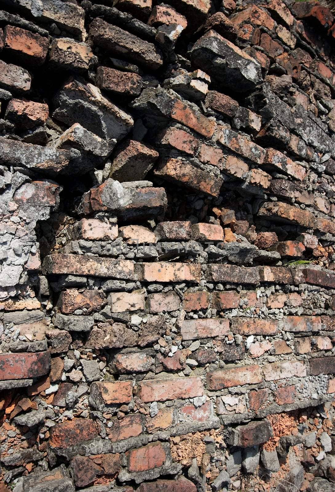 Ruined, old brick wall background