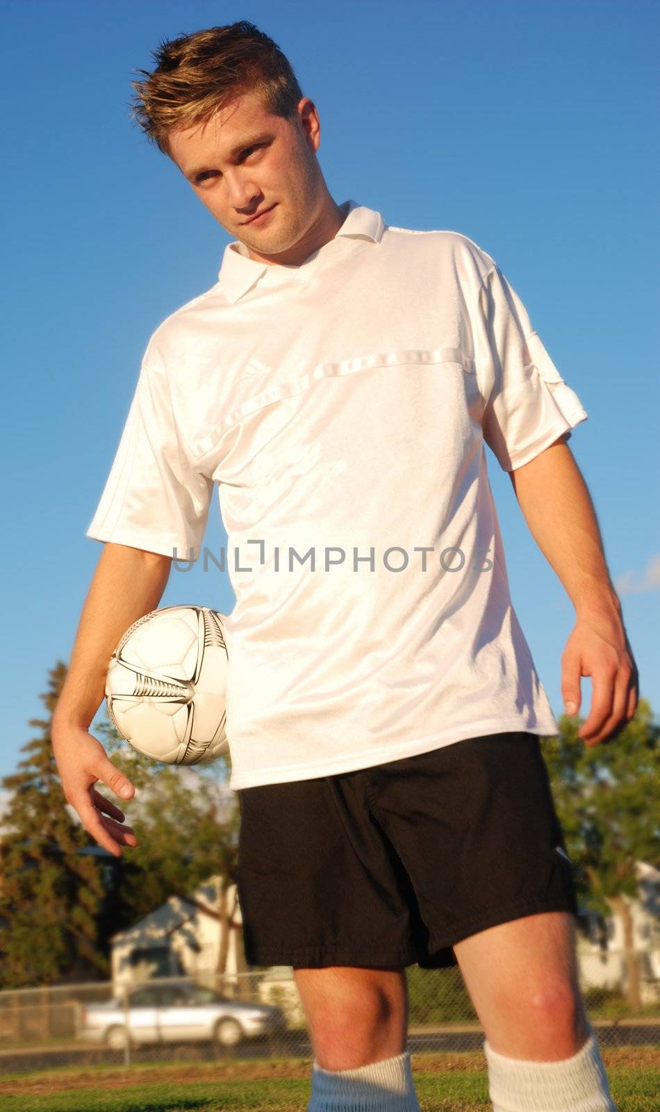 A soccer player in a field
