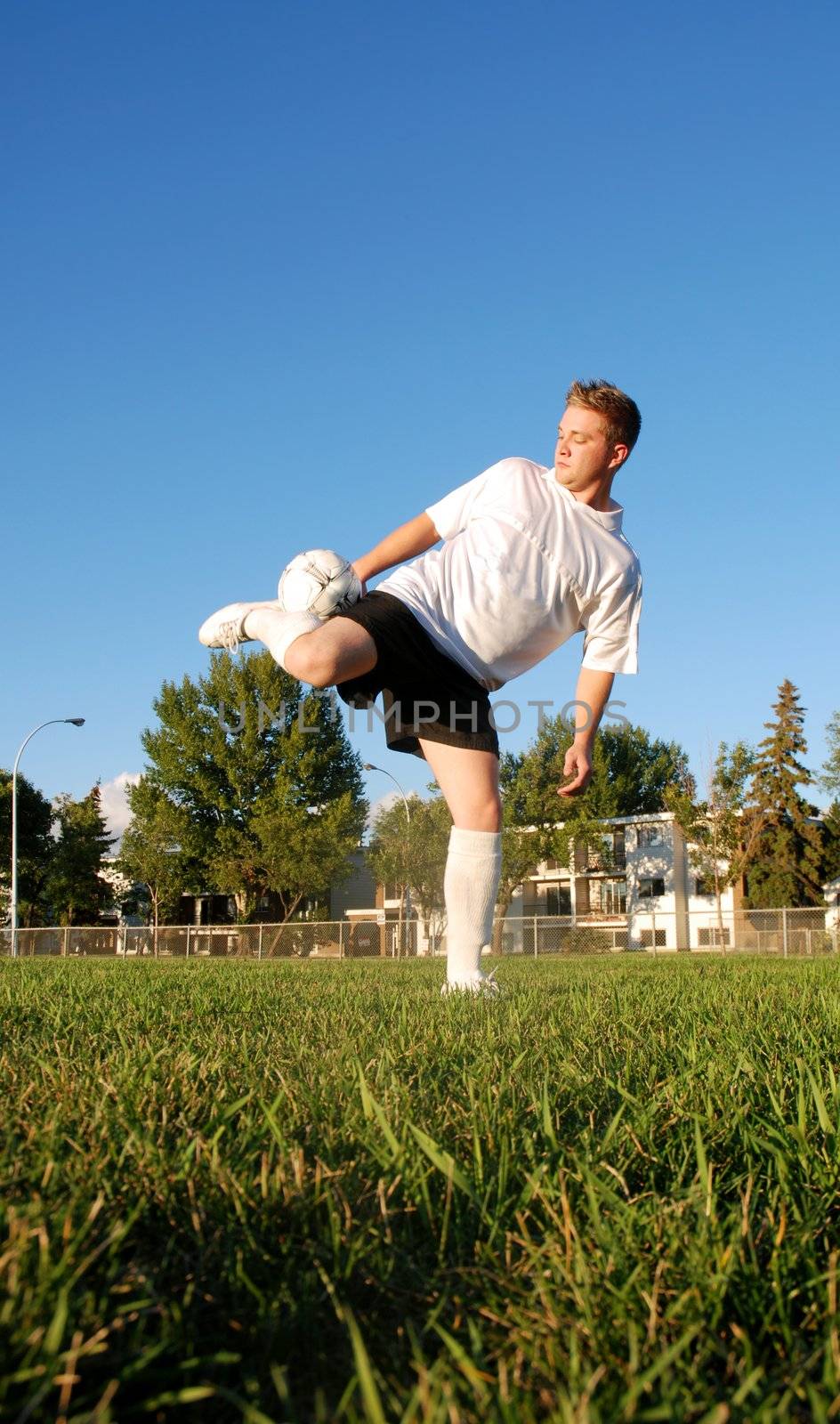 A soccer player in a field