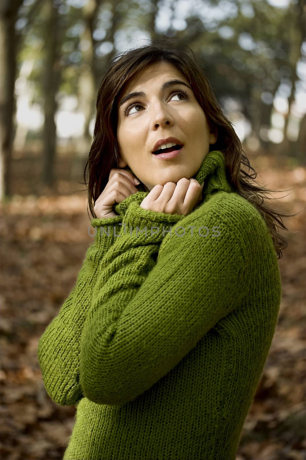 Portrait of a beautiful young woman thinking in something