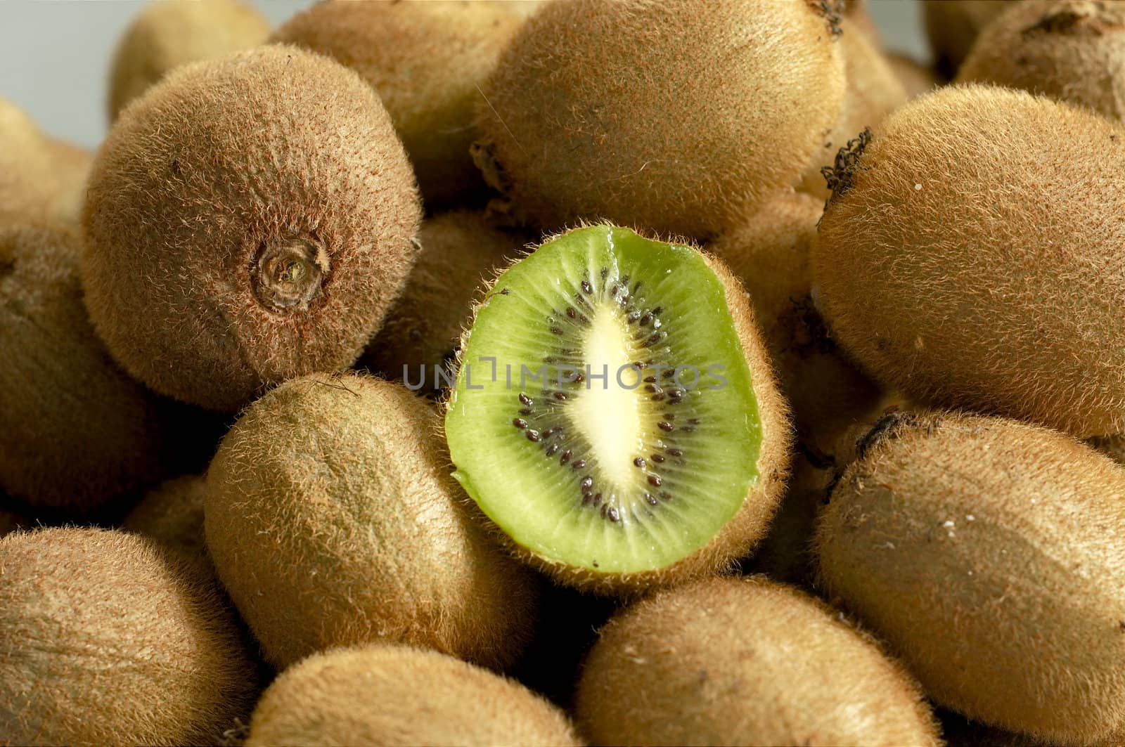 pile of kiwi fruits
