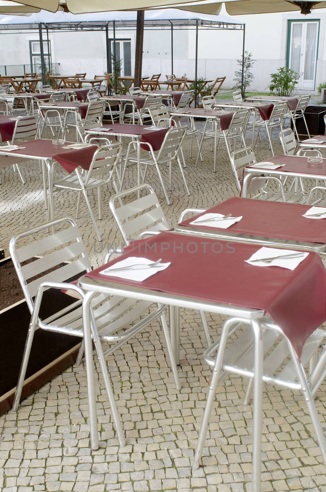 Empty table at street restaurant at Lisbon