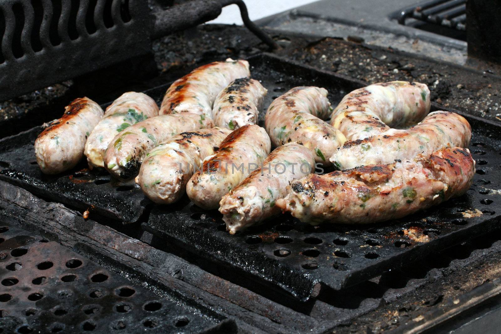 Maltese sausages on a barbecue by keki