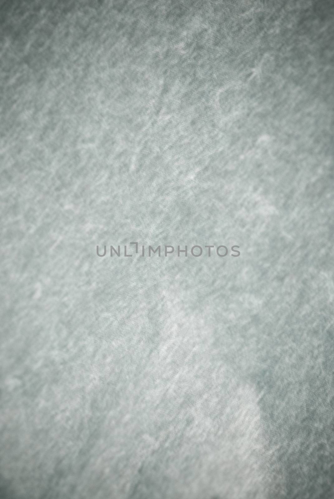 very rough pale blue paper background by paddythegolfer