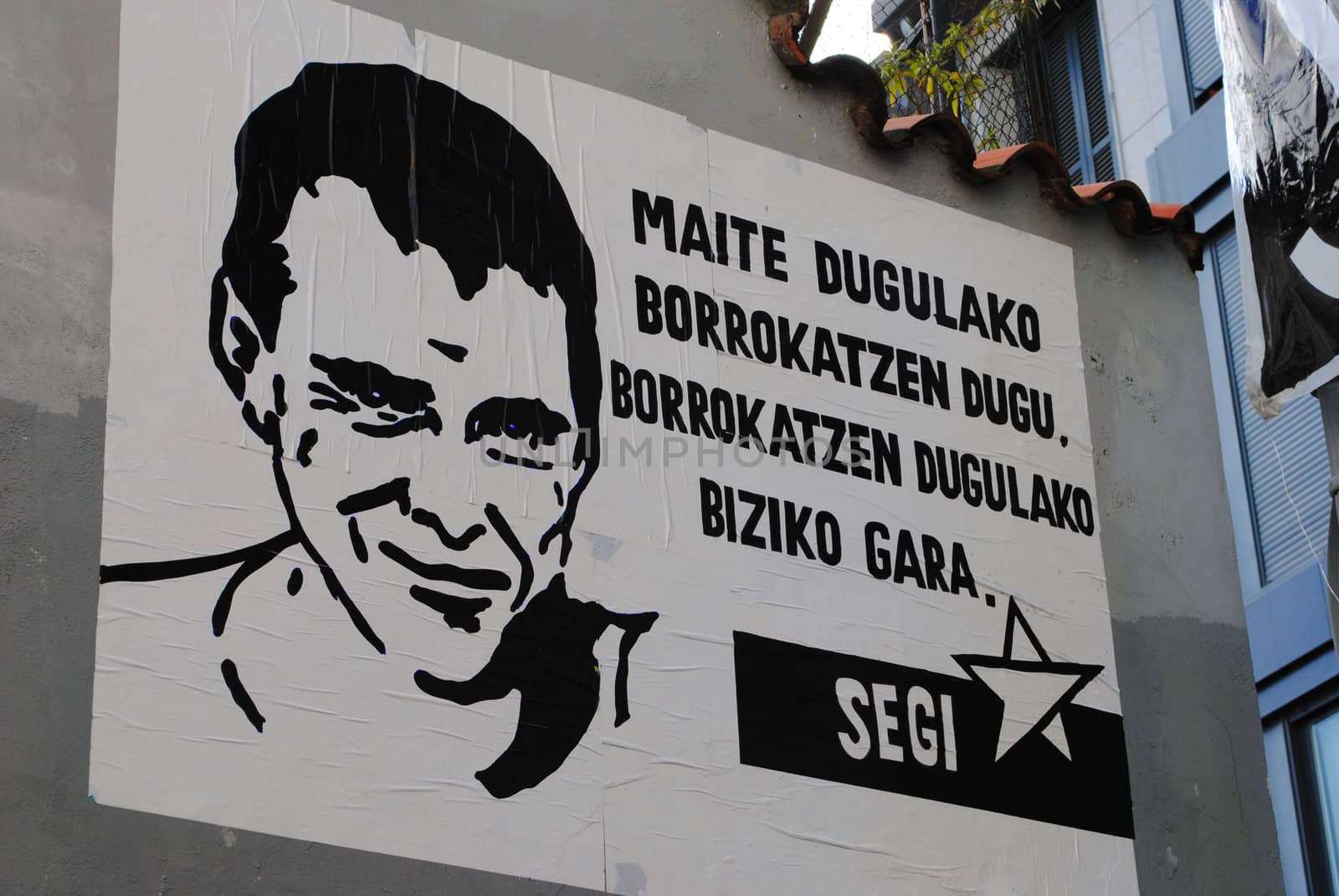 A poster commemorating diseased ETA member Jon Anza in city of Irun, Basque Country, Spain.