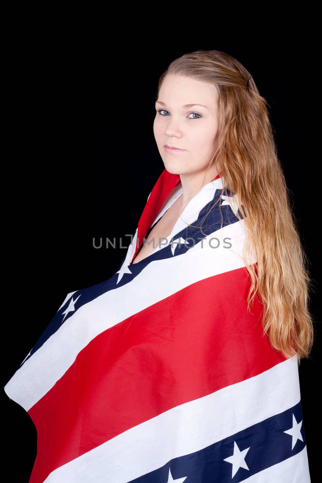 A cute girl with an American Flag style design wrapped around her.