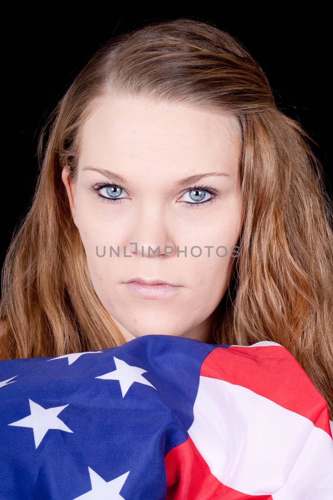 An American girl.  Her soldier is missing and she is only left with this flag.