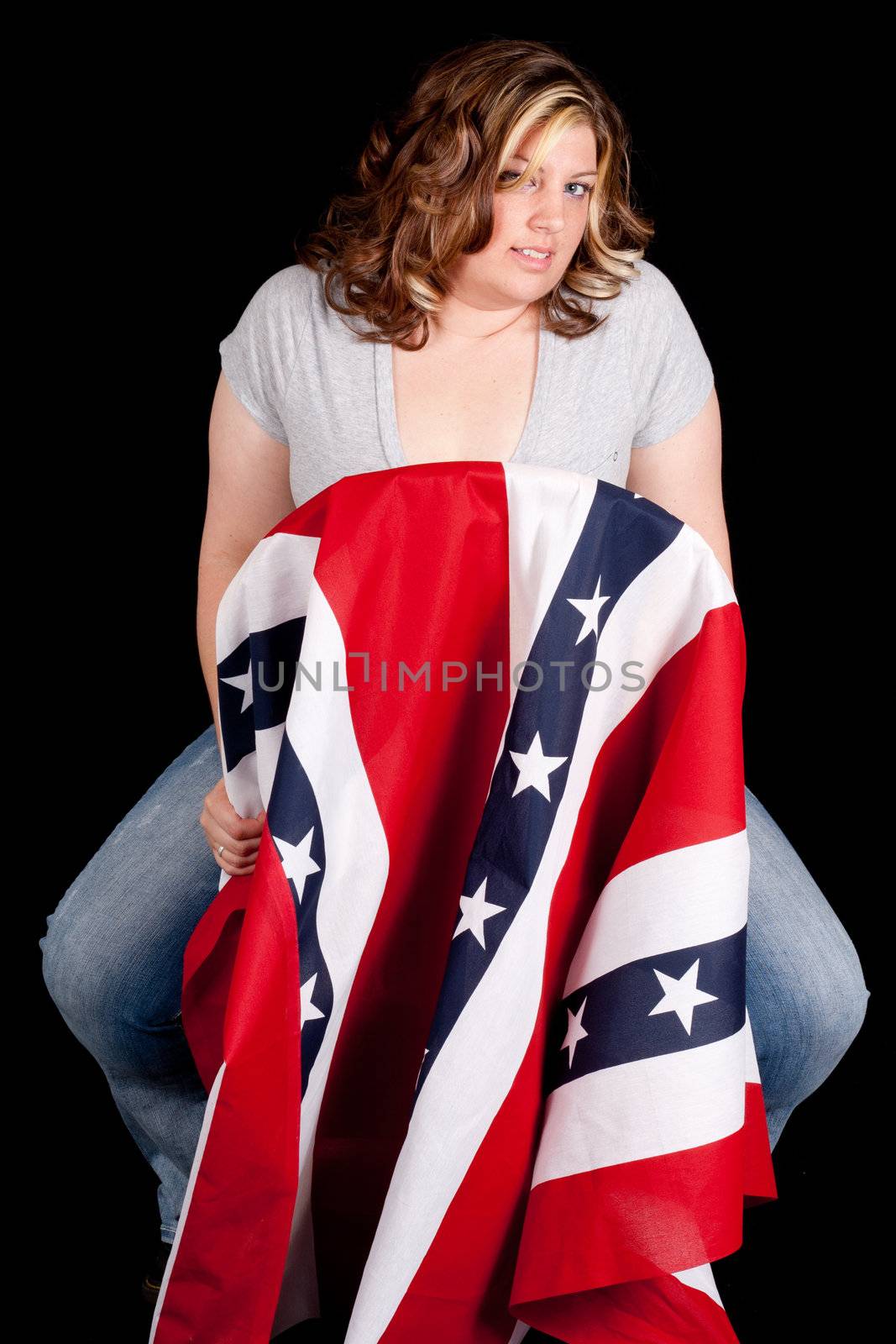 A soldiers wife, alone with her patriotism.