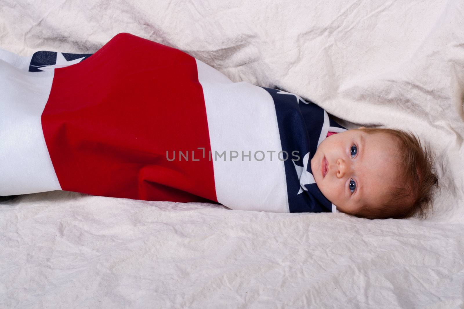 This adorable baby represents 4th of July/ Independence day and the protection that America gives all babies that are born in the United States.