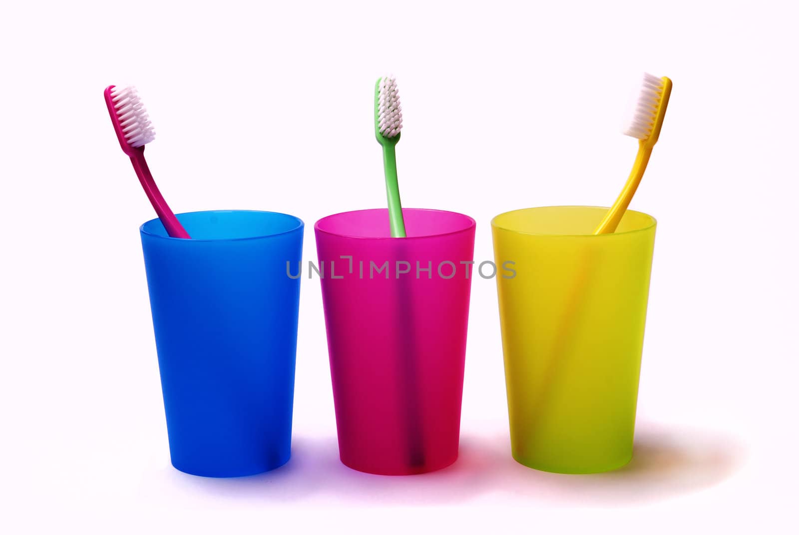 Toothbrushes in color holders