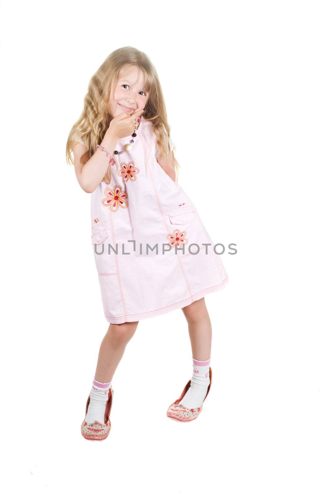 Little girl playing with big mom shoes by anytka