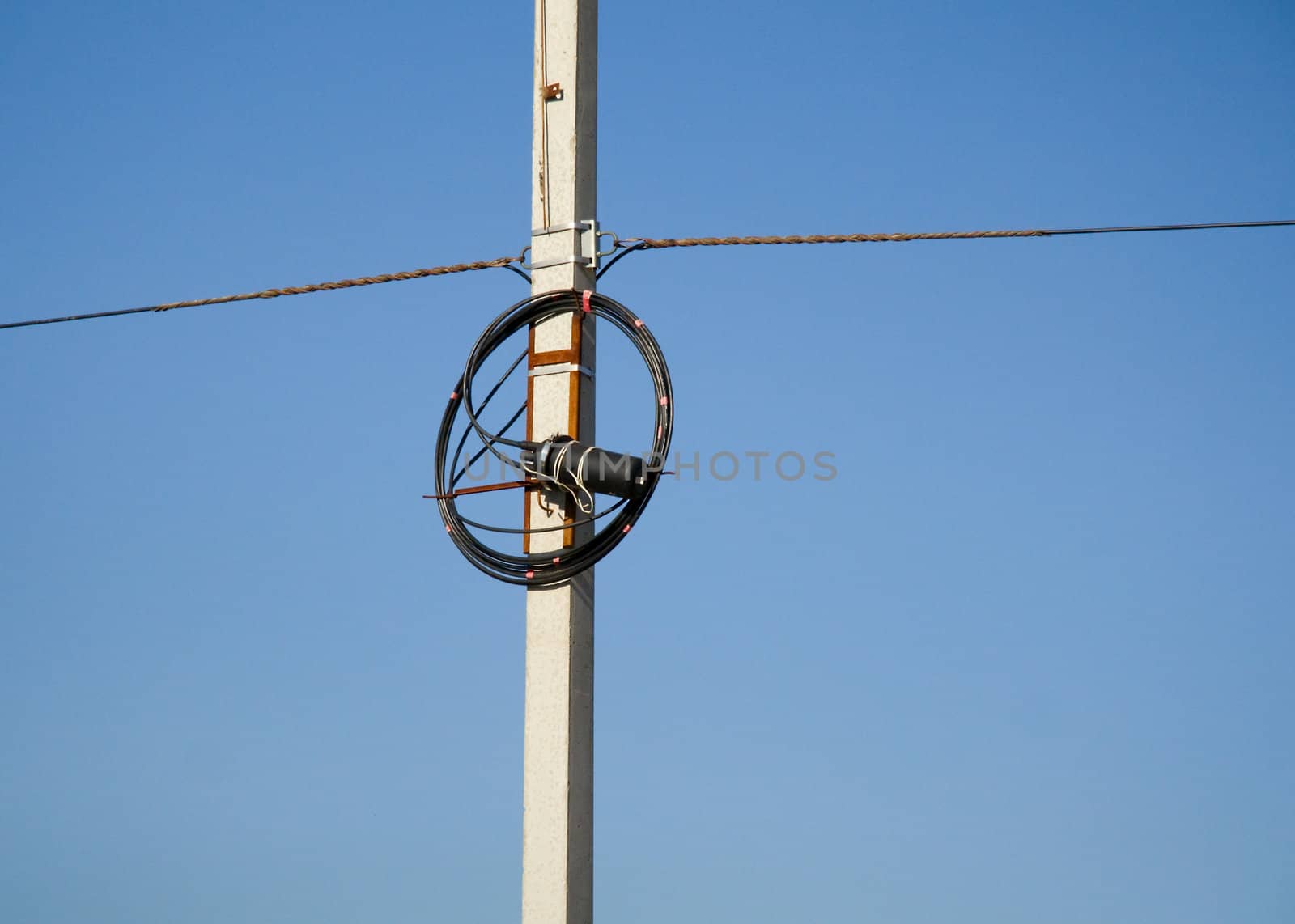 communication wires over blue sky Background