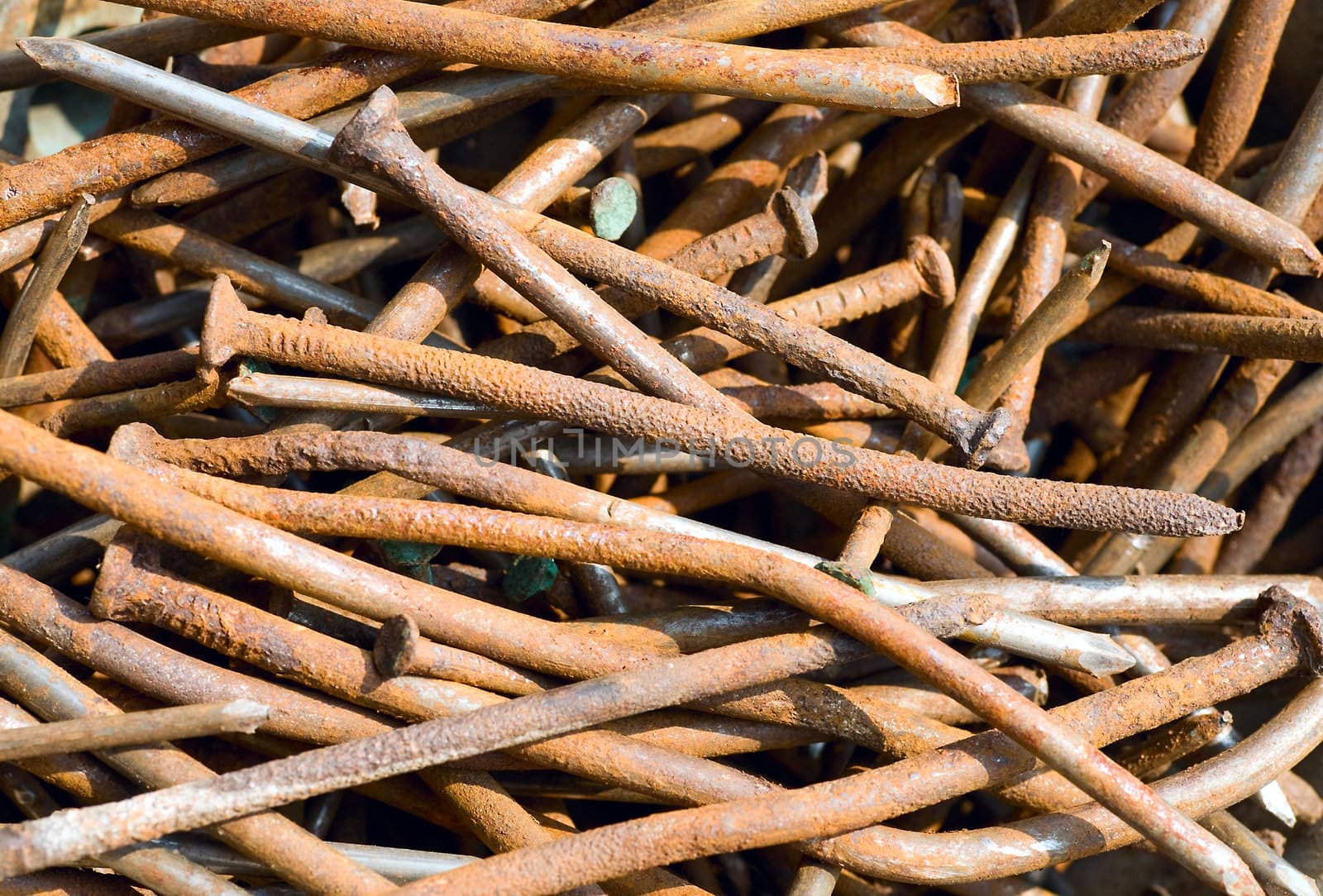 Large pile of rusty  nails. Backgrounds
