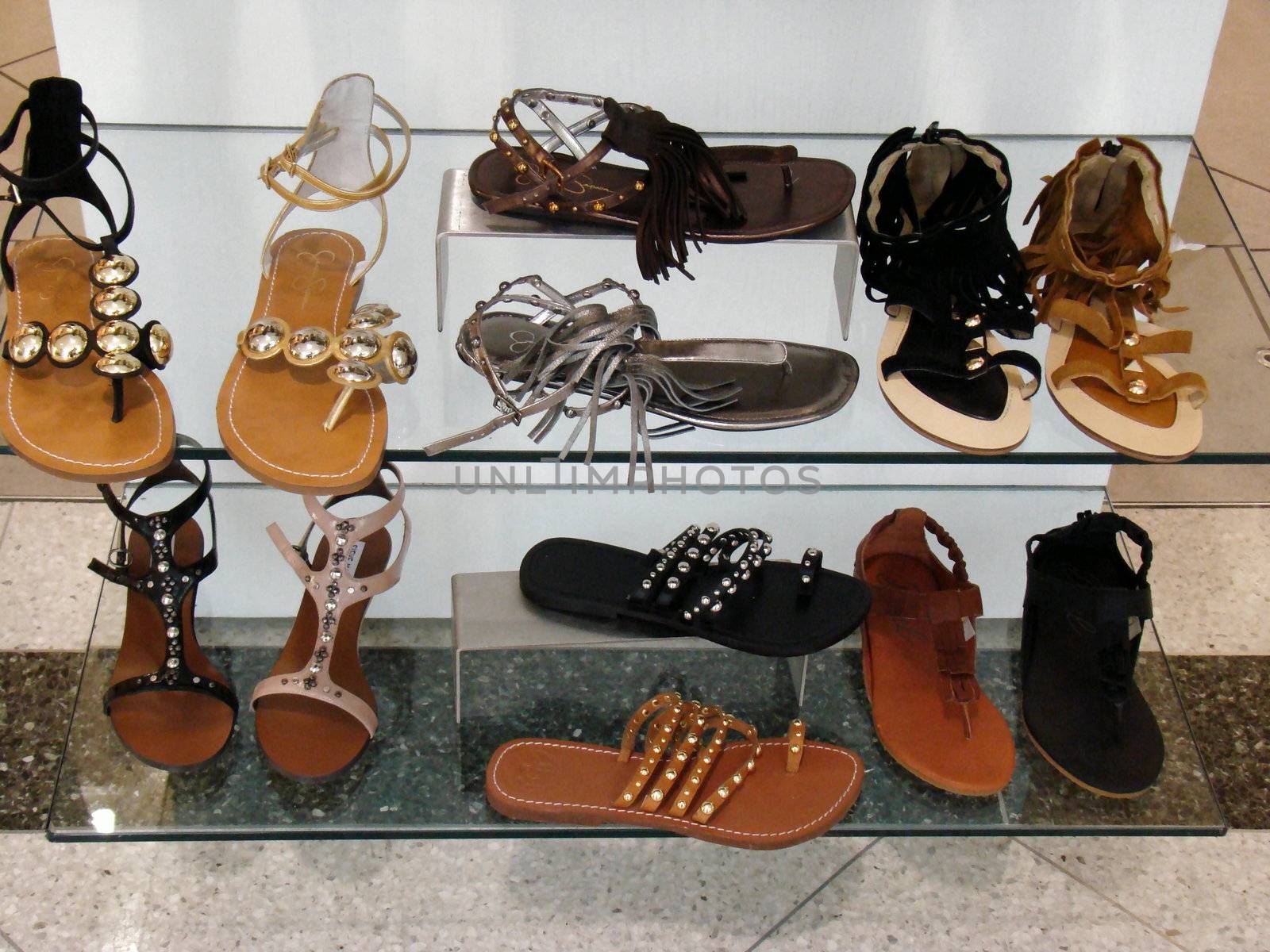 summer shoe display in shoe store window