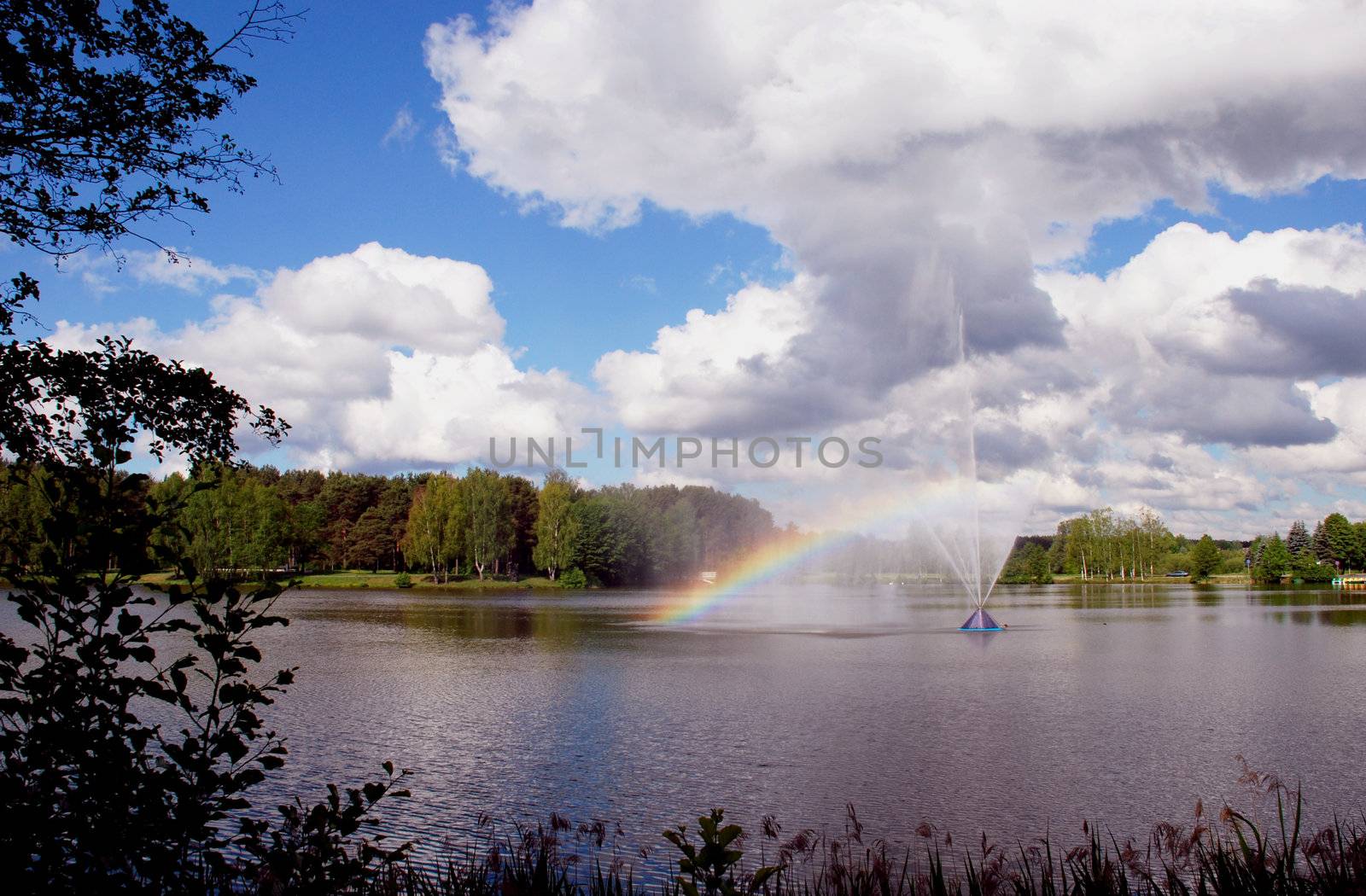 Rainbow over the lake's fountain don?t need rain