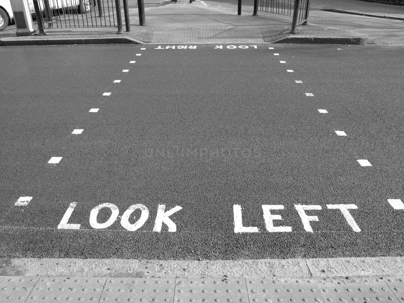 Look Left warning at a pedestrian zebra crossing in a London street