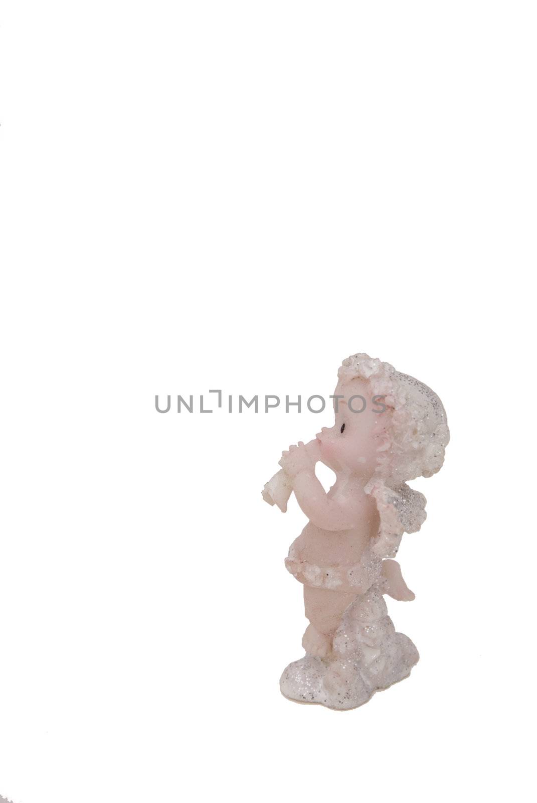 Figure of little angel with a trumpet isolated on a white background