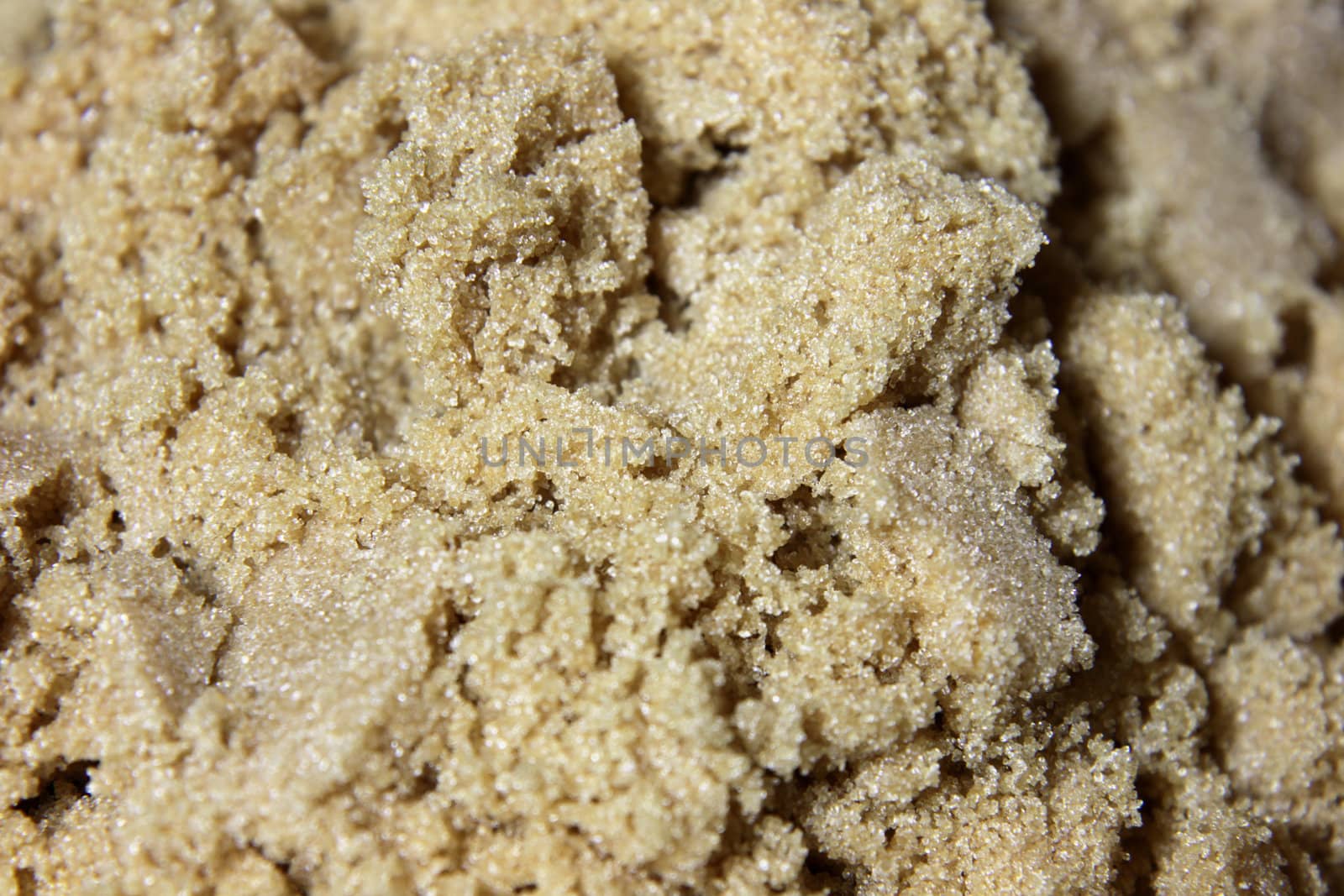 A close-up of brown sugar crystals.

