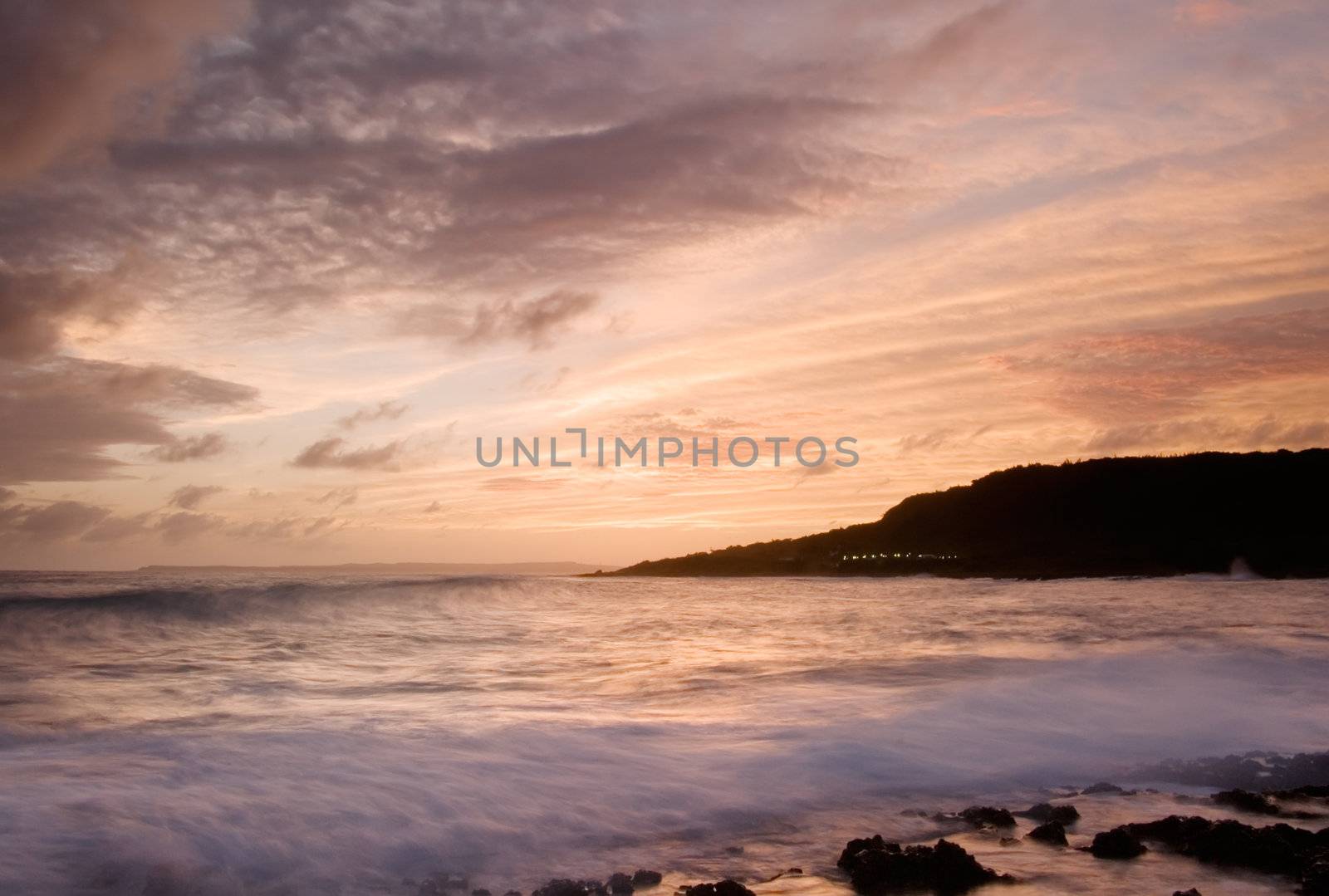 It is sunset of beautiful coral reef coastline.