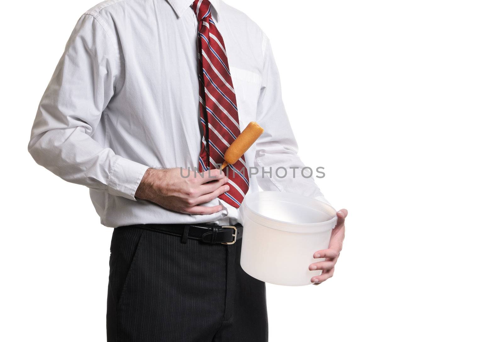 A businessman holding a pail and his stomach after eating a bad corn dog, isolated against a white background.