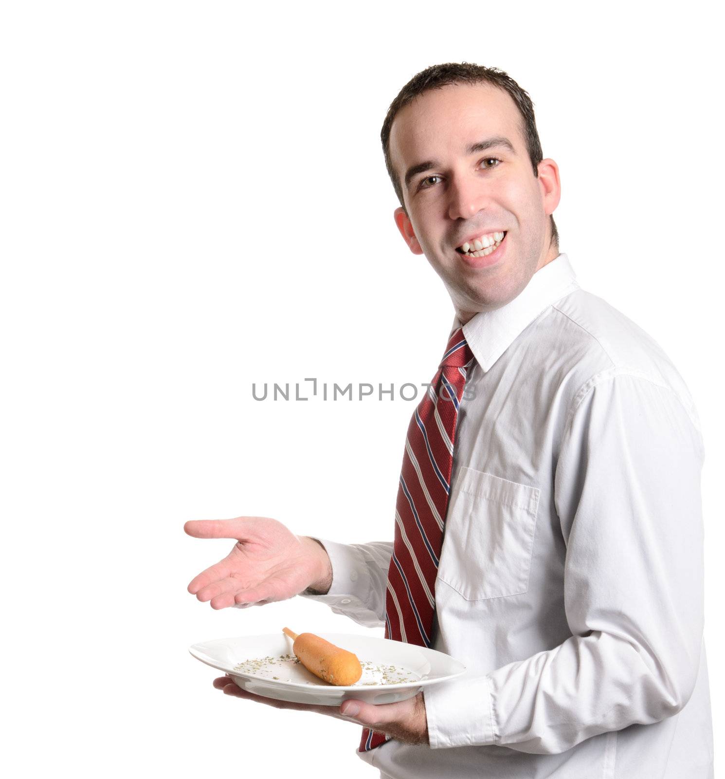 A young server is displaying a battered wiener on a plate, isolated against a white background.