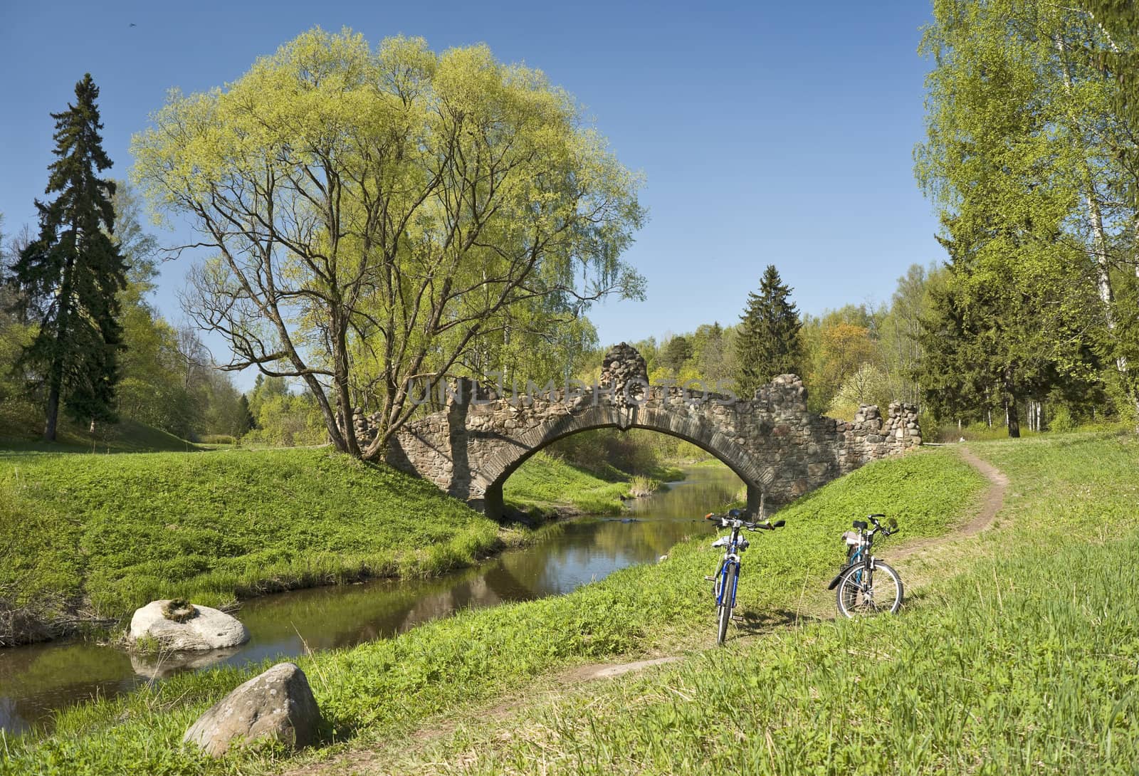 Old bridge and two bicycles by mulden