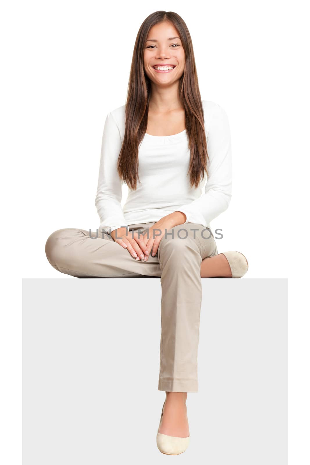 Sign people. Woman sitting on blank billboard placard sign. Casual young beautiful multiracial Asian isolated on white background.