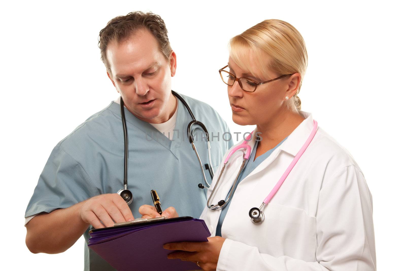 Male and Female Doctors Looking Over Files Isolated on a White Background.