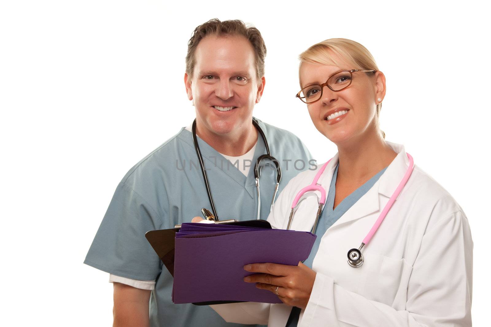 Male and Female Doctors Looking Over Files Isolated on a White Background.