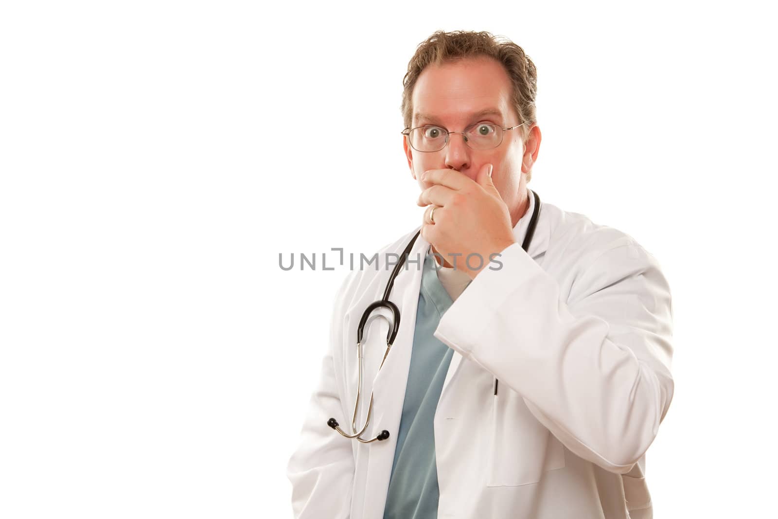 Male Doctor with Concerned Look and Hand Over Mouth Isolated on a White Background.