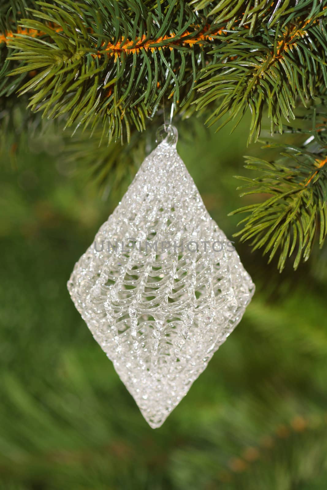 Christmas tree decoration on green background