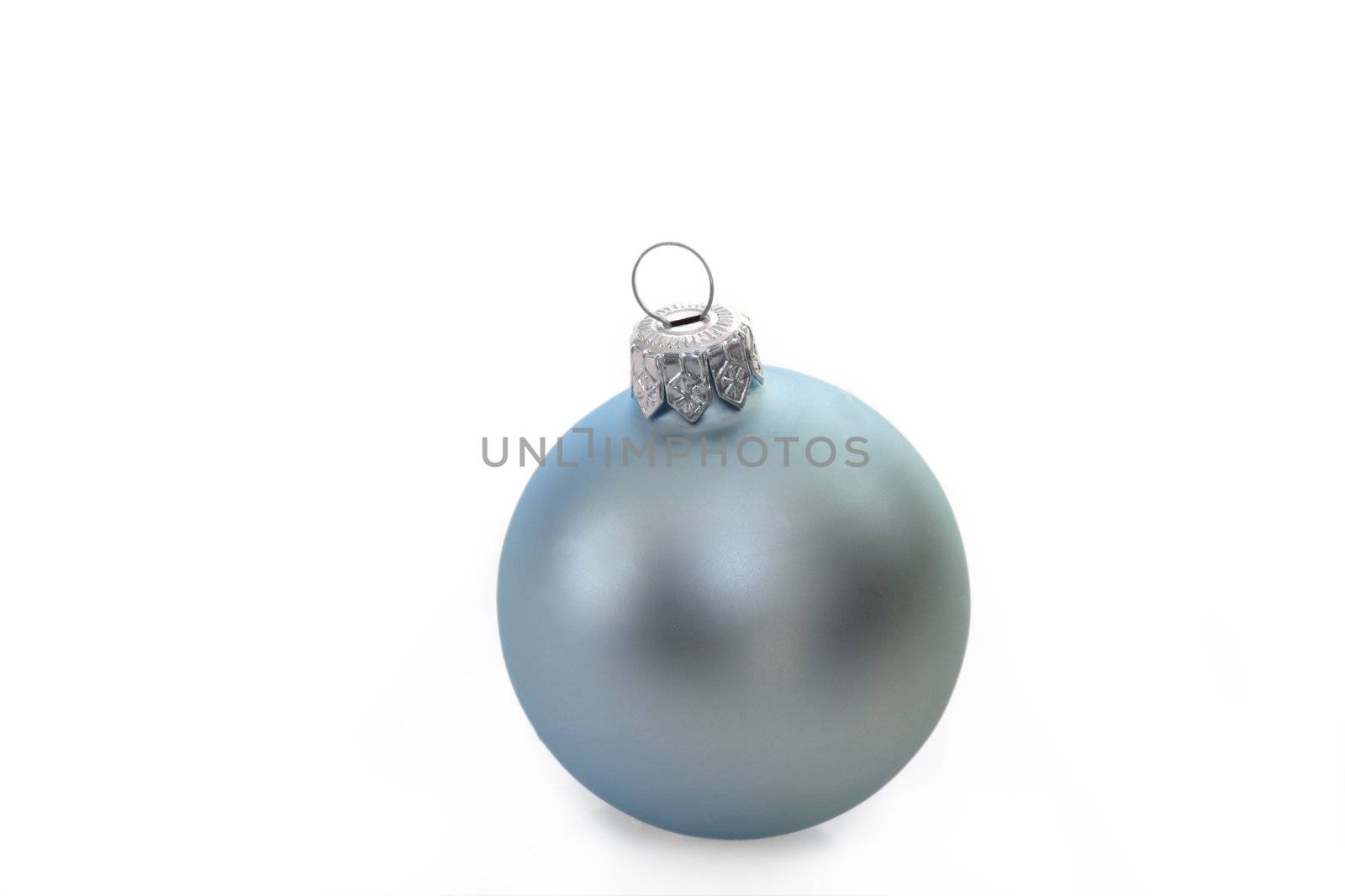 Christmas ball on bright background. Shot in studio.