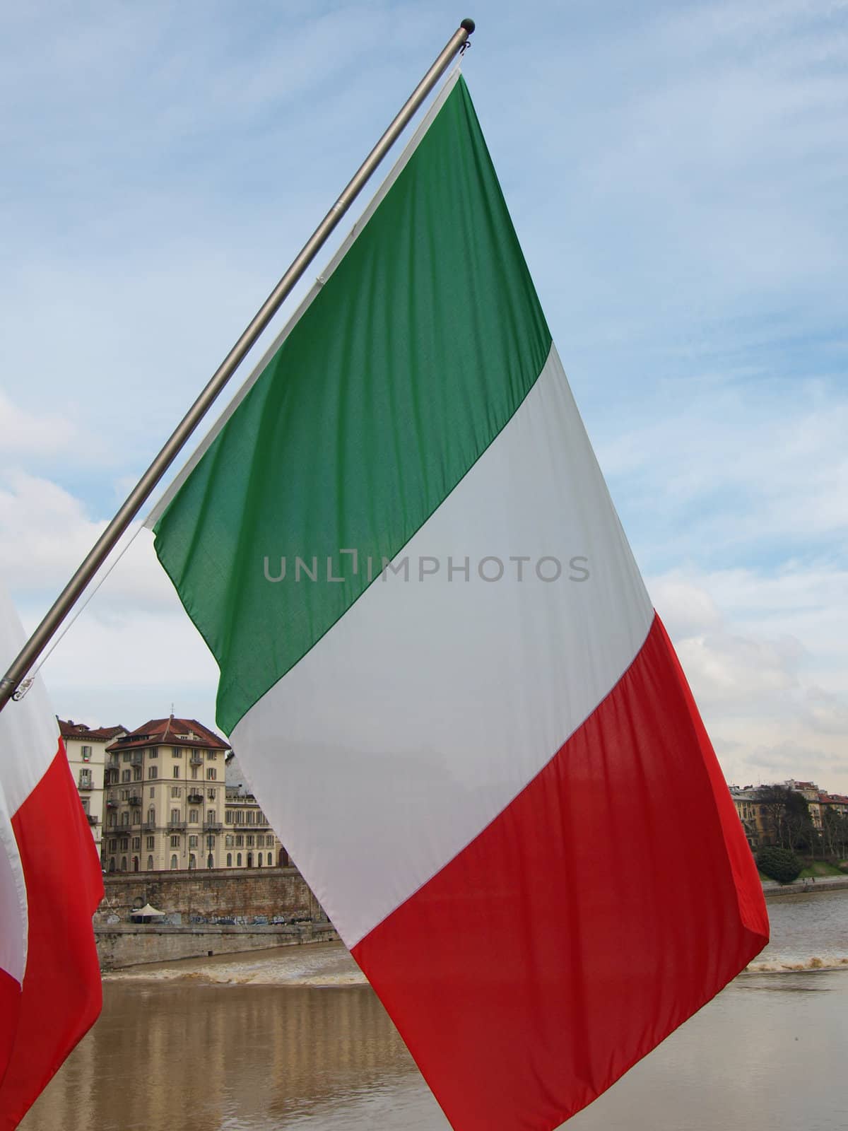 Italian flags on River Po in Italy for the 150th anniversary year of Italian unification