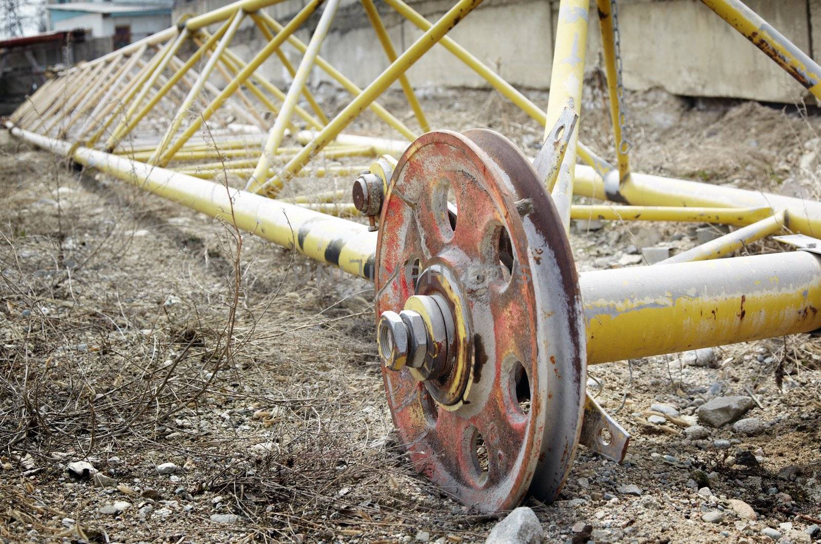 Close-up horizontal photo of the heavy industry machinery. Metal wheelbase. Natural colors and light