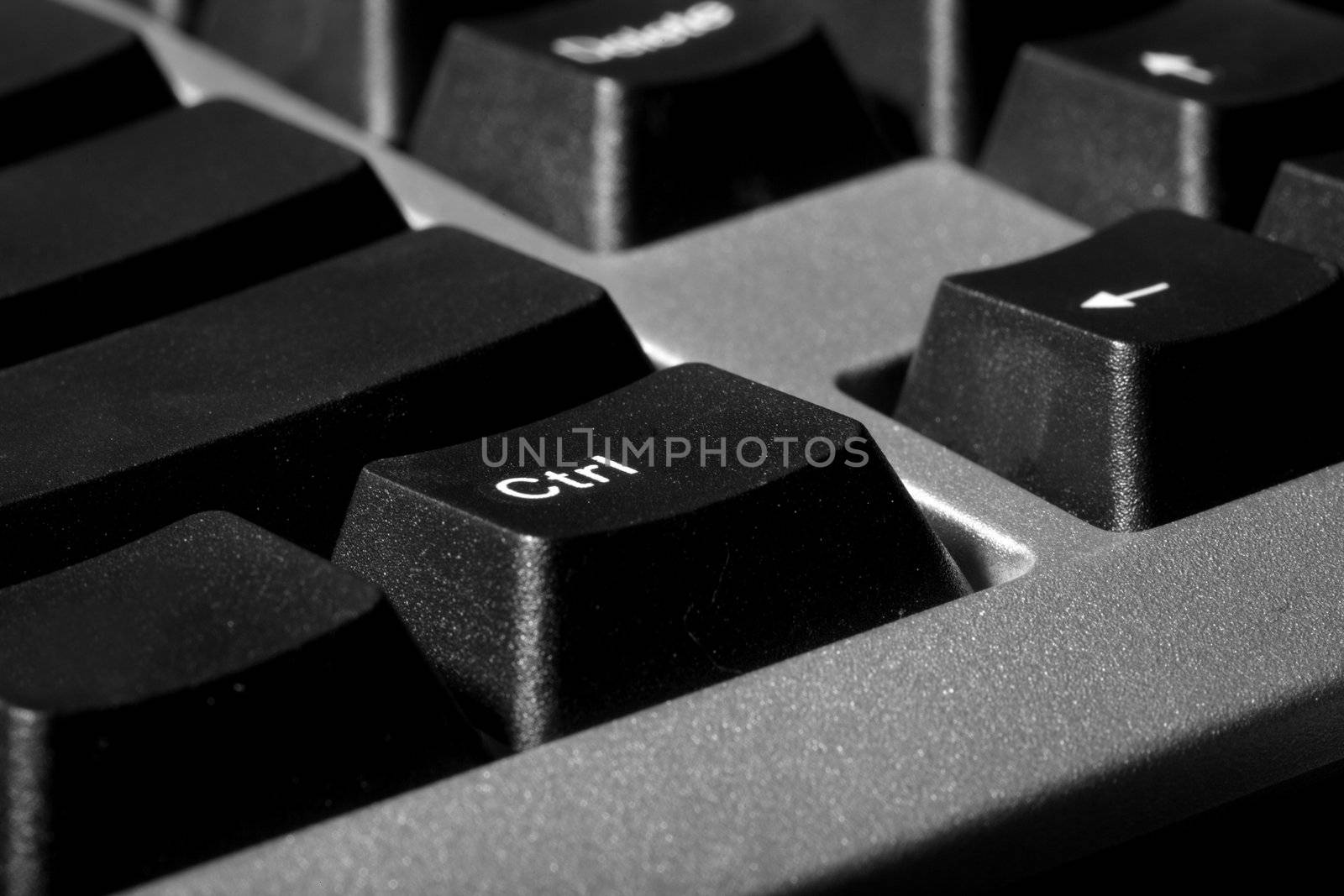 Fragment of computer keyboard with Control button. Close-up photo with shallow depth of field for natural view