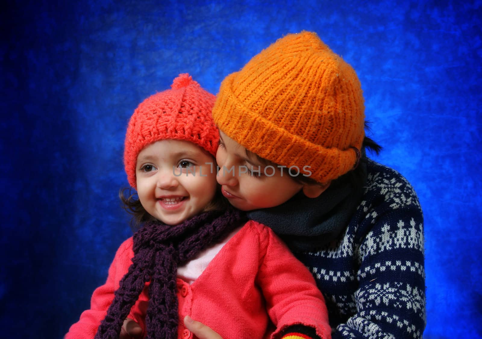 Brother and sister having fun in winter by Erdosain