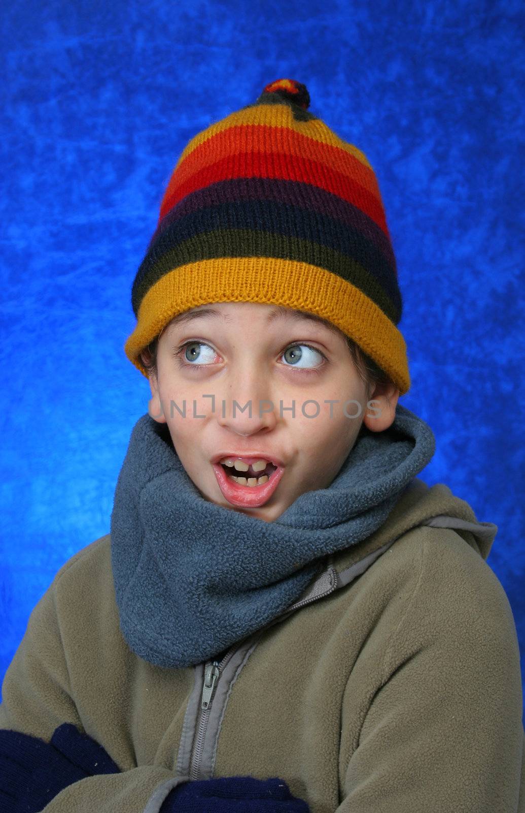 Boy having fun in winter by Erdosain