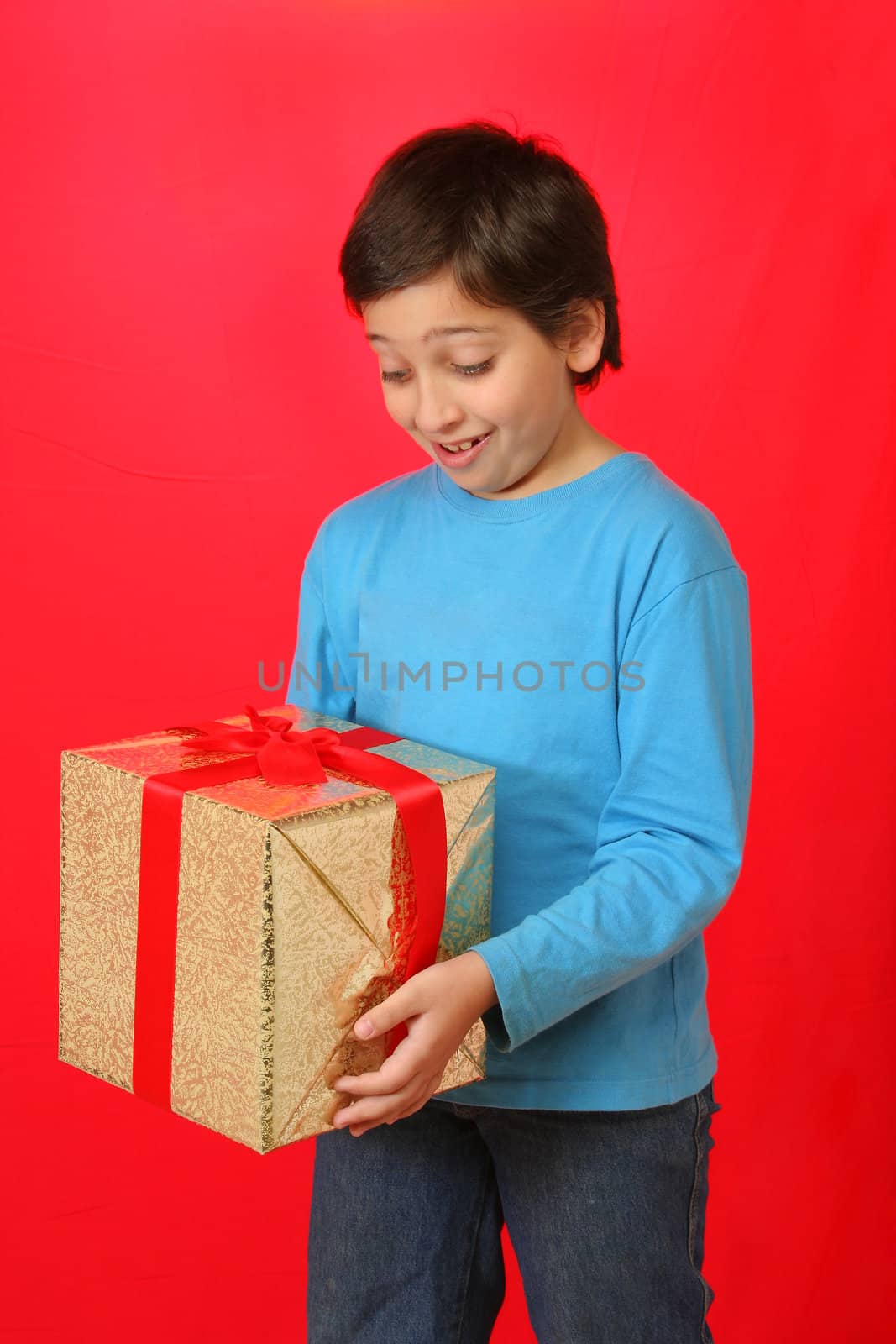 Cute boy with a christmas gift