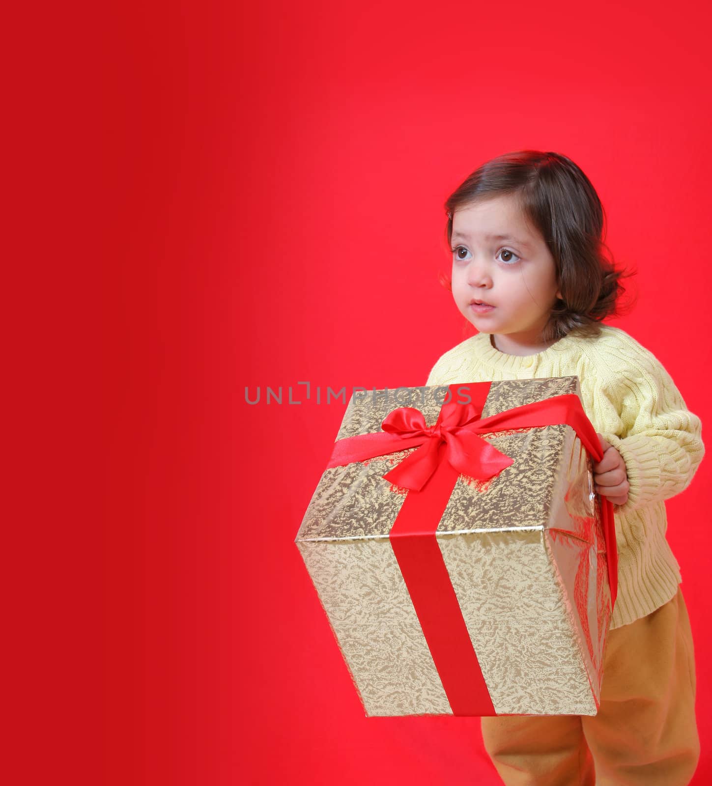 Toddler with a christmas gift by Erdosain