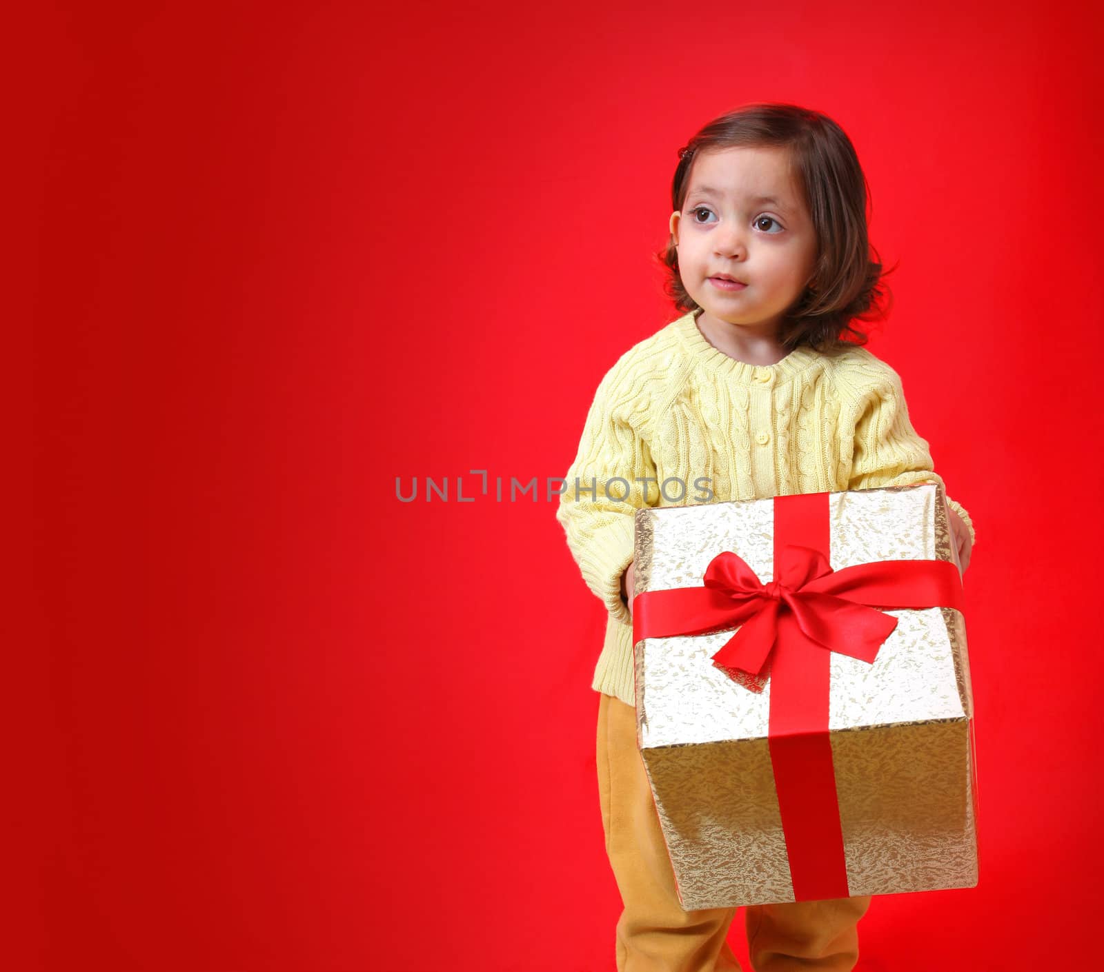 Toddler with a christmas gift by Erdosain