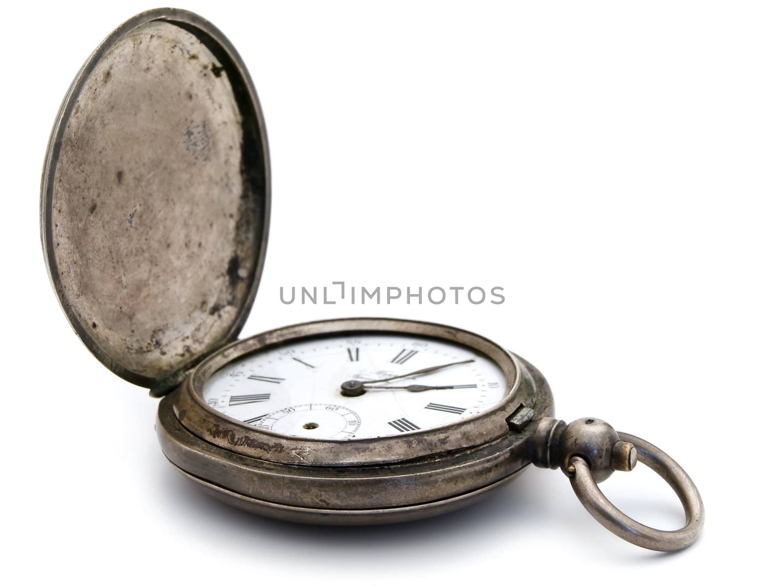  closed old silver pocket watch on a white background 