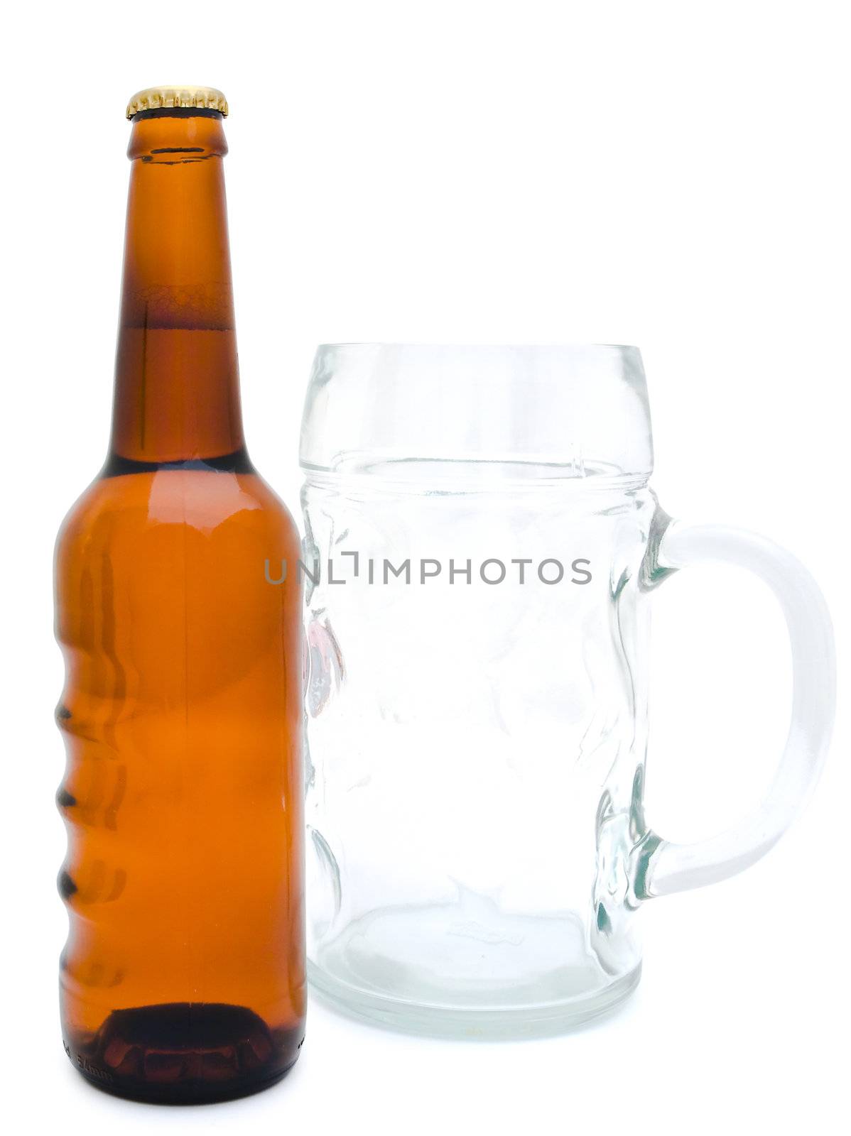 Single bottle of the beer and glass against the white background